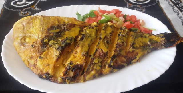 A delicious grilled fish cooked in a creamy coconut sauce, a specialty from the coastal regions of Kenya